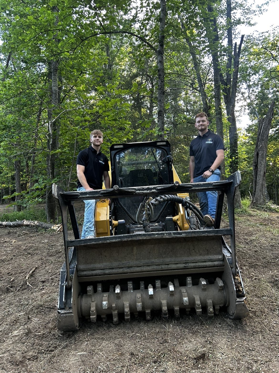 Timber Land Clearing team with forestry mulcher
